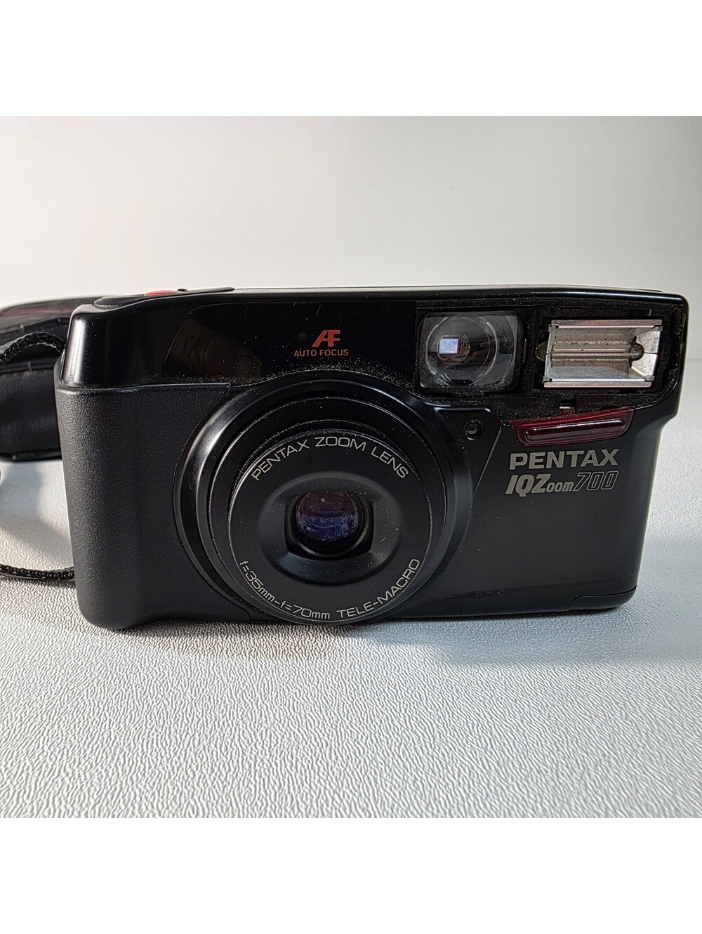 Pentax IQZoom 700 35mm Point & Shoot Film Camera W/Case TESTED Missing Plastic